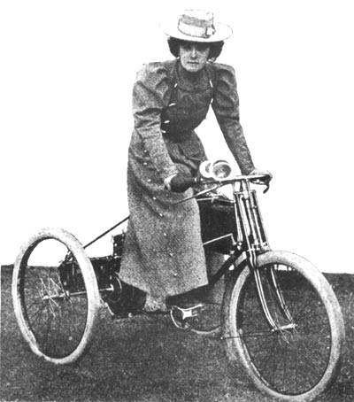 Serpolette on her Gladiator motor tricycle